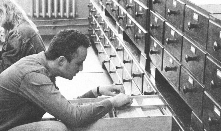 Jörg Hutter researches in an index card catalog.