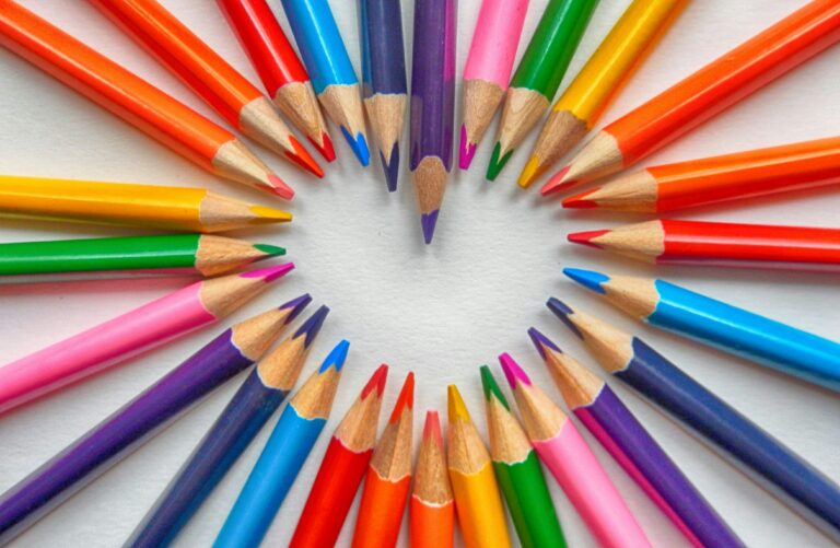 Colored pencils form a heart.